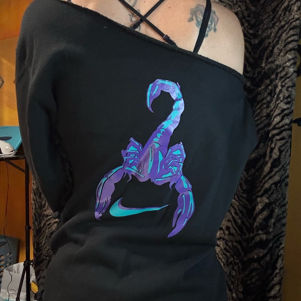Black Off-Shoulder Top with Purple Scorpion Design